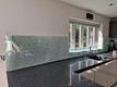 Measuring glass for splashbacks